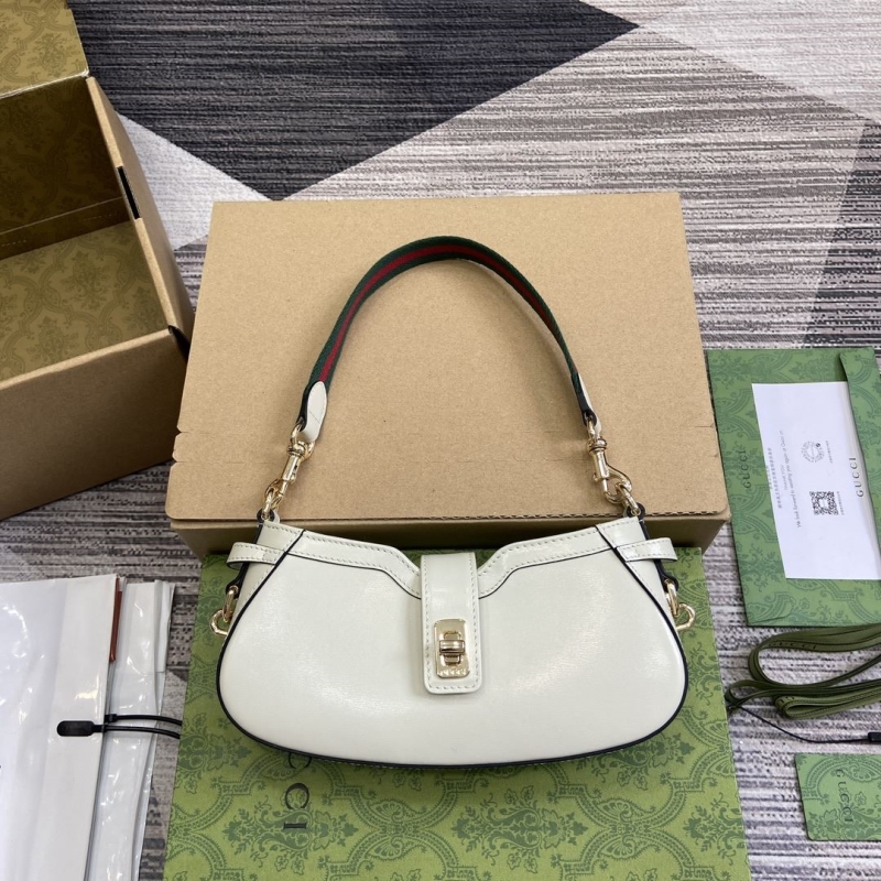 G*u*i top handle bags